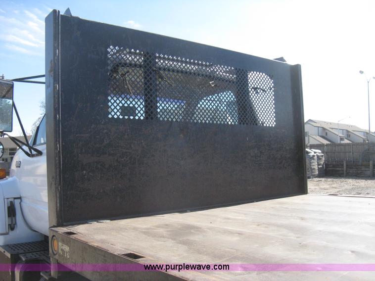 image for item B8272 1991 GMC TopKick SLE flatbed dump truck