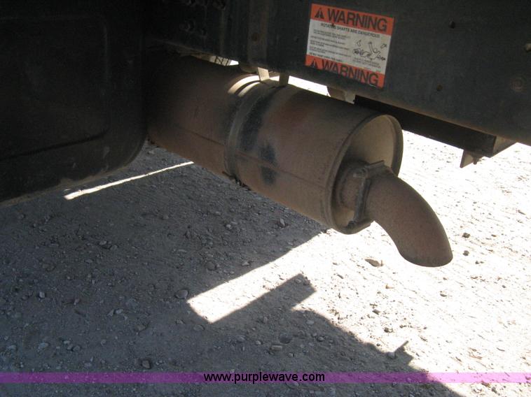 image for item B8272 1991 GMC TopKick SLE flatbed dump truck