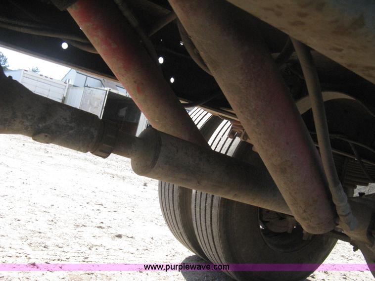 image for item B8272 1991 GMC TopKick SLE flatbed dump truck