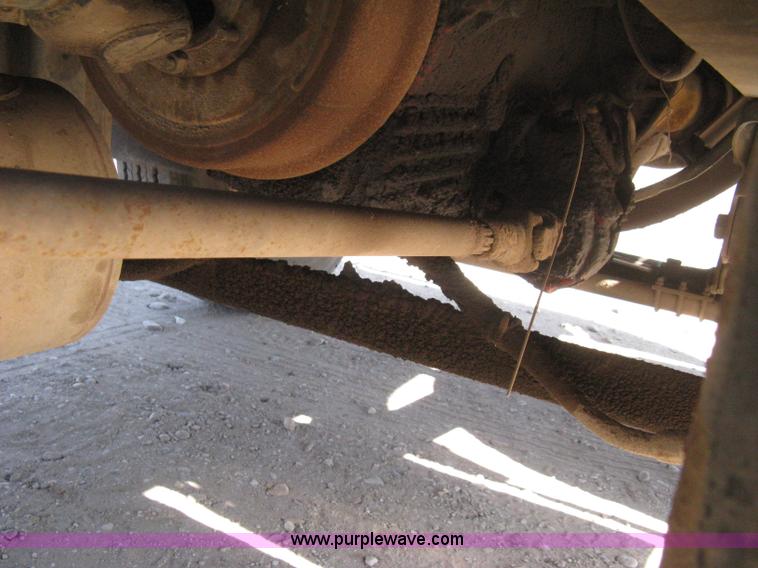 image for item B8272 1991 GMC TopKick SLE flatbed dump truck