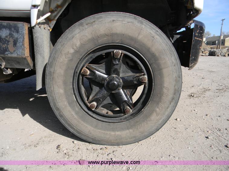 image for item B8272 1991 GMC TopKick SLE flatbed dump truck