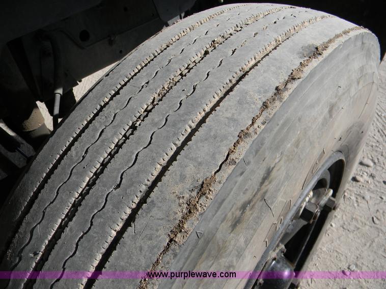 image for item B8272 1991 GMC TopKick SLE flatbed dump truck