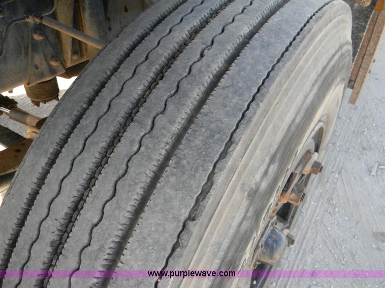 image for item B8272 1991 GMC TopKick SLE flatbed dump truck