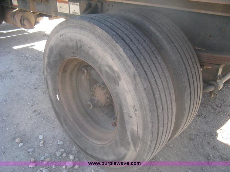 image for item B8272 1991 GMC TopKick SLE flatbed dump truck