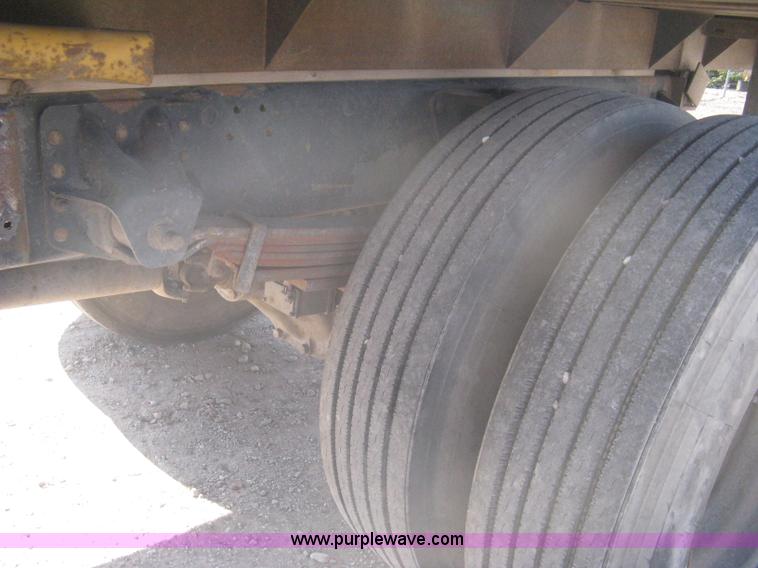 image for item B8272 1991 GMC TopKick SLE flatbed dump truck