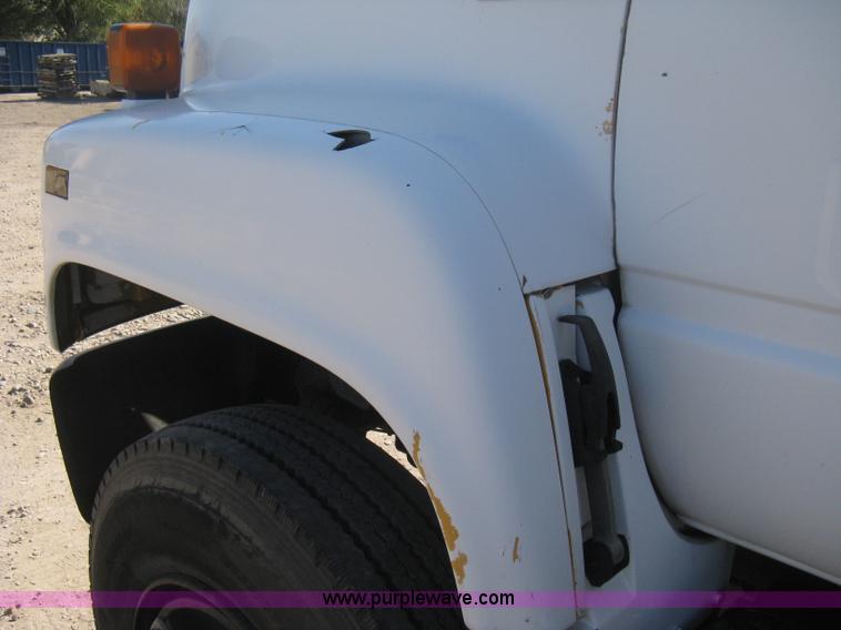 image for item B8272 1991 GMC TopKick SLE flatbed dump truck