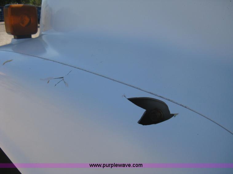 image for item B8272 1991 GMC TopKick SLE flatbed dump truck