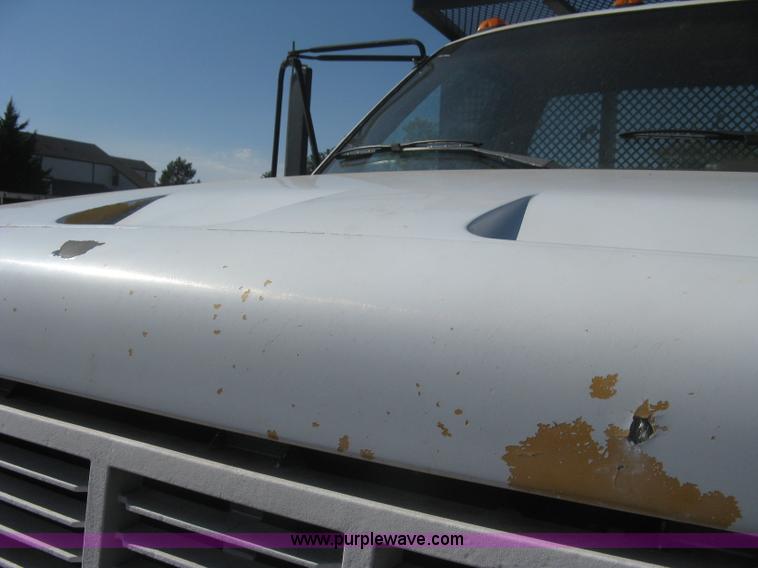 image for item B8272 1991 GMC TopKick SLE flatbed dump truck