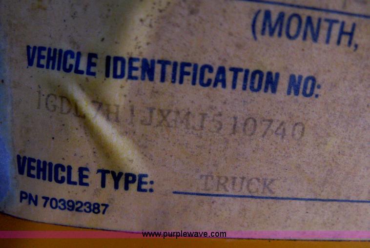 image for item B8272 1991 GMC TopKick SLE flatbed dump truck