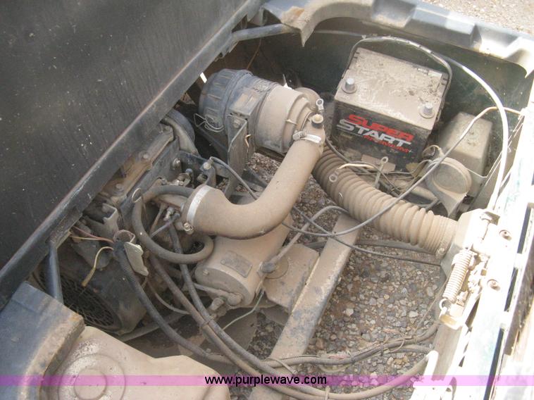 image for item B8279 (2) EZ-GO 1200G Work Horse golf carts