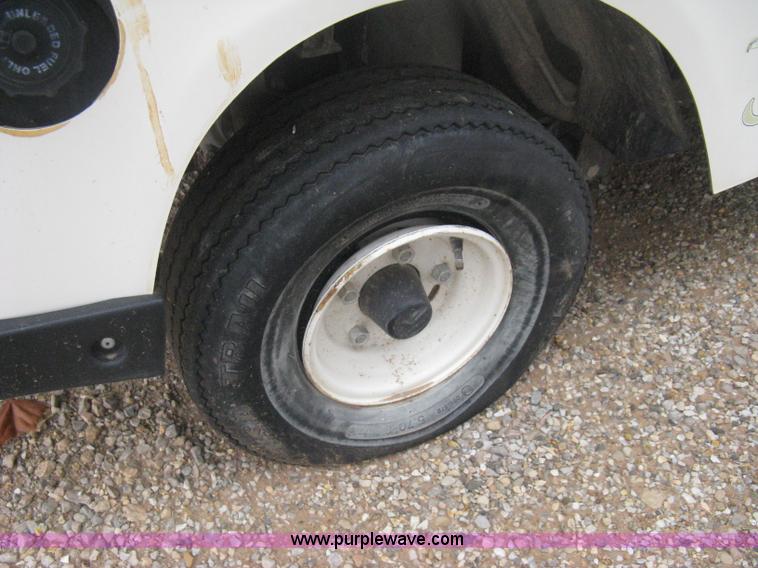 image for item B8281 EZ-GO 954F shuttle golf cart