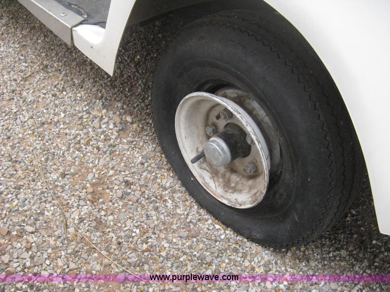 image for item B8281 EZ-GO 954F shuttle golf cart