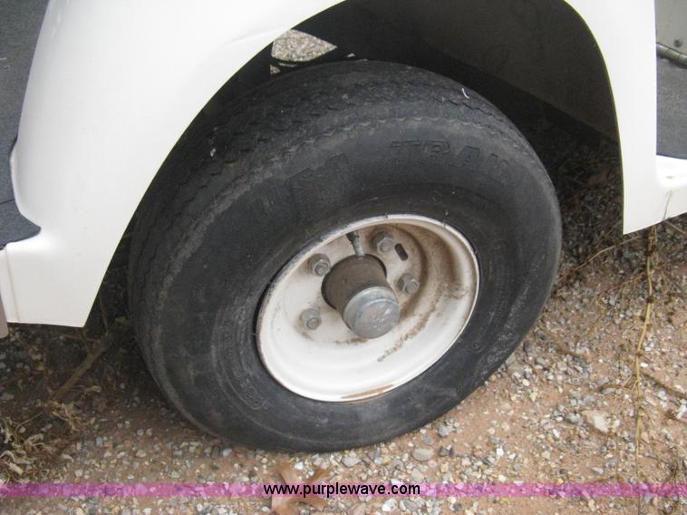 image for item B8281 EZ-GO 954F shuttle golf cart