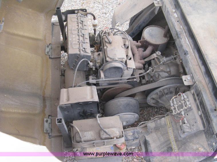 image for item B8282 EZ-GO 954F shuttle golf cart