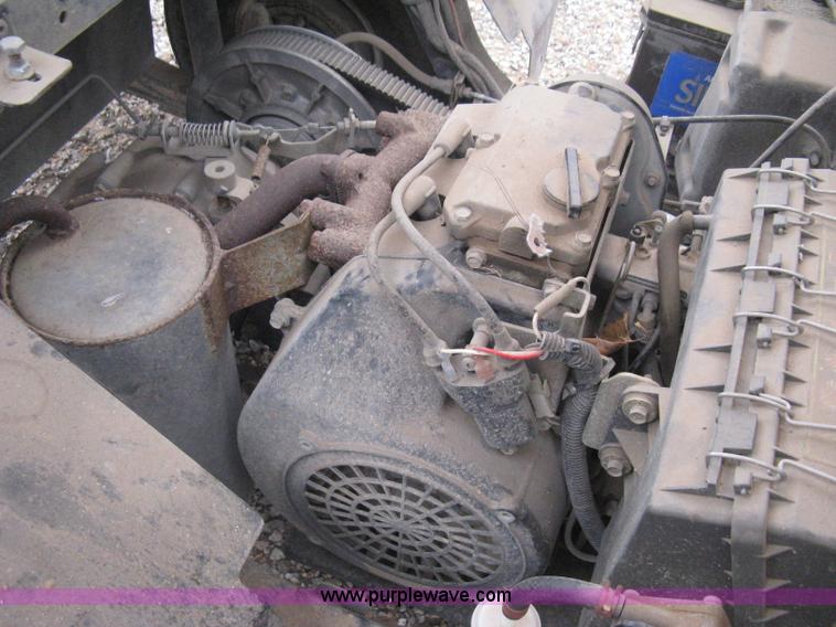 image for item B8282 EZ-GO 954F shuttle golf cart