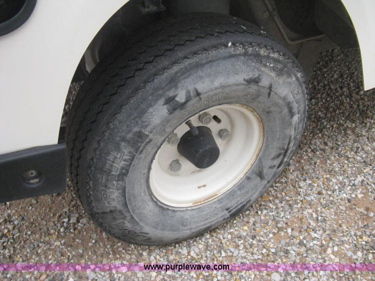 image for item B8282 EZ-GO 954F shuttle golf cart