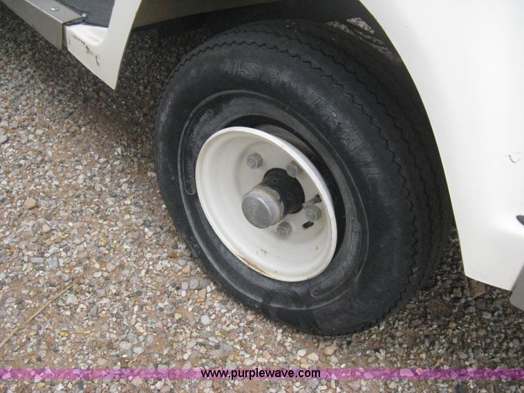 image for item B8282 EZ-GO 954F shuttle golf cart