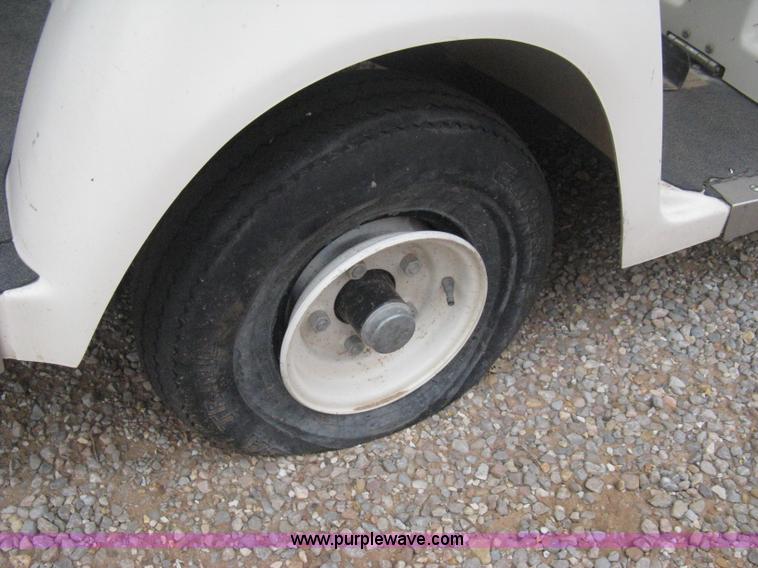 image for item B8282 EZ-GO 954F shuttle golf cart