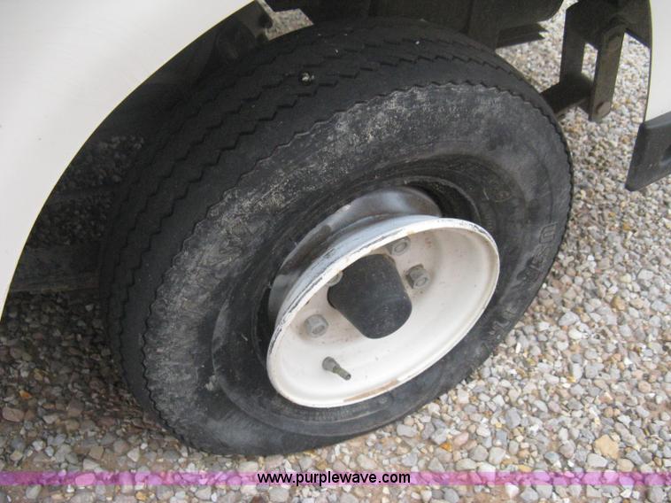 image for item B8282 EZ-GO 954F shuttle golf cart