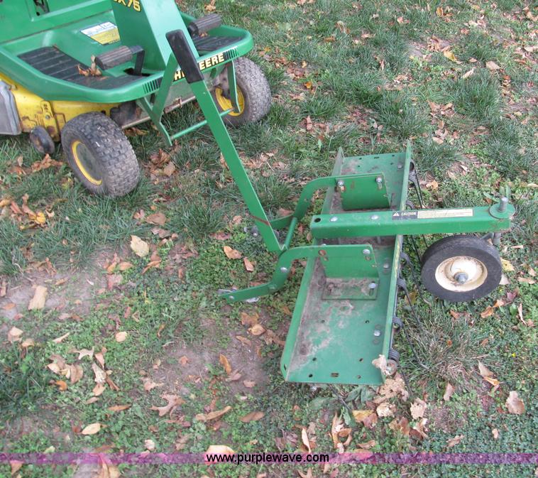 image for item E5663 John Deere SX75 lawn mower
