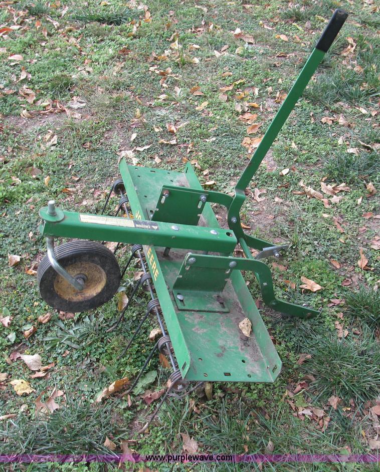 image for item E5663 John Deere SX75 lawn mower