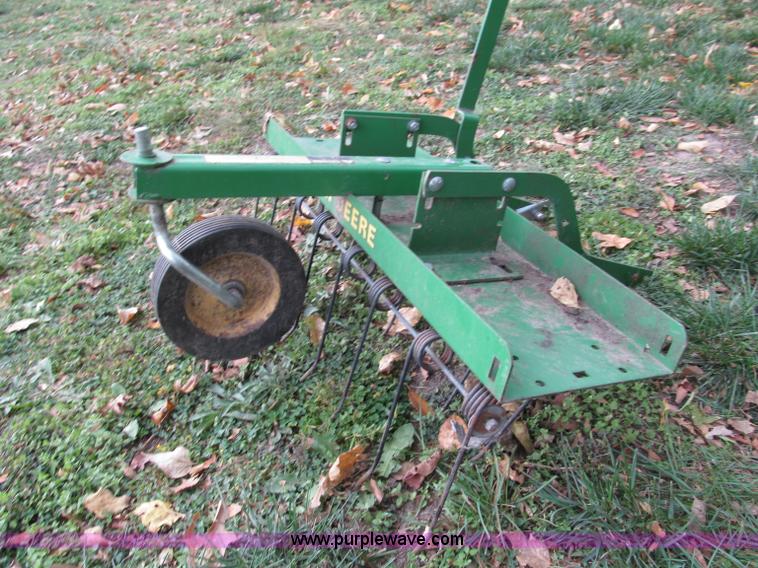 image for item E5663 John Deere SX75 lawn mower