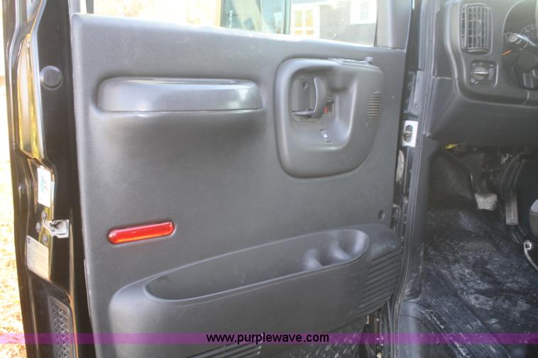 image for item F2692 2006 GMC C5500 Crew Cab flatbed truck