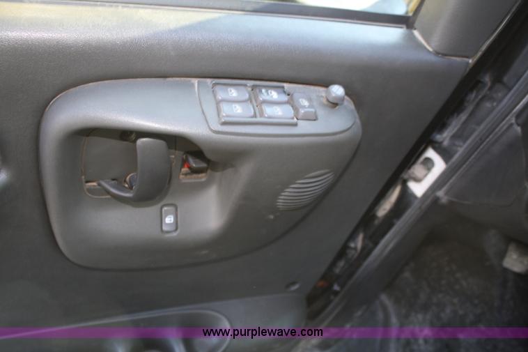 image for item F2692 2006 GMC C5500 Crew Cab flatbed truck