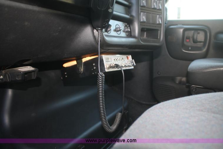 image for item F2692 2006 GMC C5500 Crew Cab flatbed truck