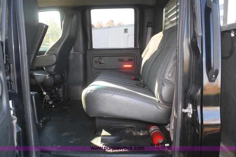 image for item F2692 2006 GMC C5500 Crew Cab flatbed truck