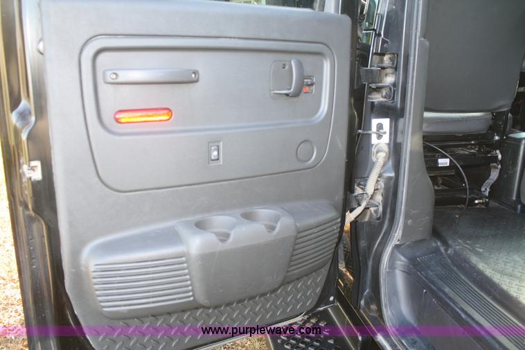 image for item F2692 2006 GMC C5500 Crew Cab flatbed truck