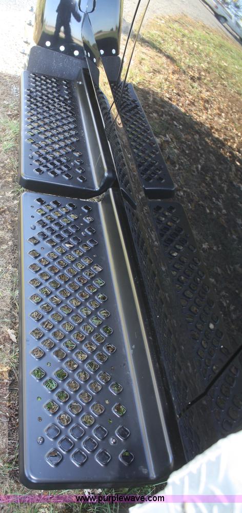 image for item F2692 2006 GMC C5500 Crew Cab flatbed truck