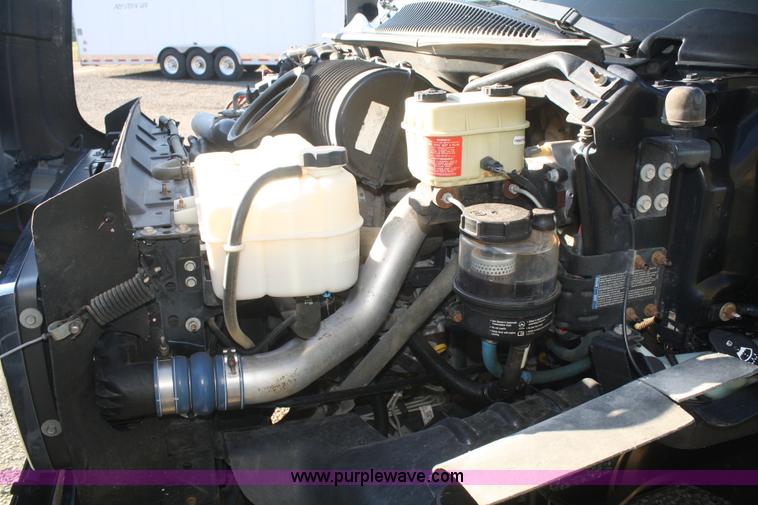 image for item F2692 2006 GMC C5500 Crew Cab flatbed truck