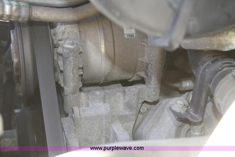 image for item F2692 2006 GMC C5500 Crew Cab flatbed truck