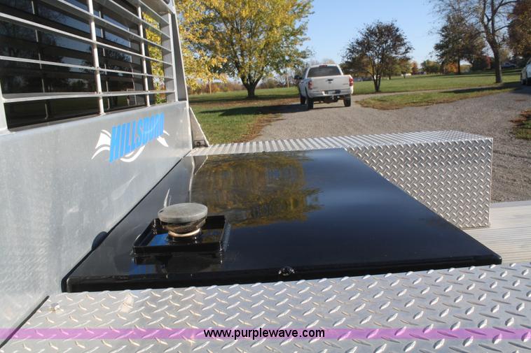 image for item F2692 2006 GMC C5500 Crew Cab flatbed truck