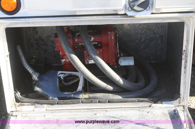 image for item F2692 2006 GMC C5500 Crew Cab flatbed truck