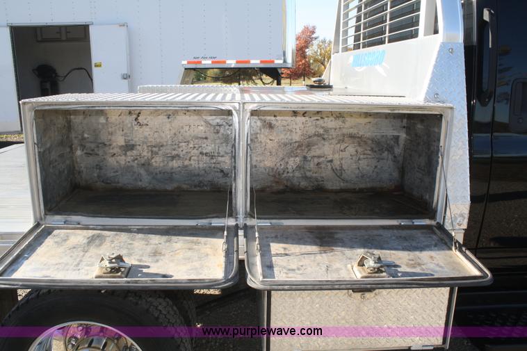 image for item F2692 2006 GMC C5500 Crew Cab flatbed truck