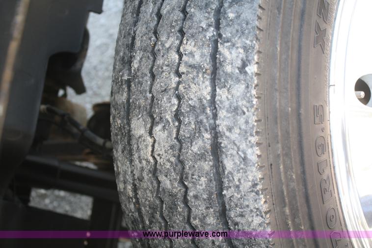 image for item F2692 2006 GMC C5500 Crew Cab flatbed truck