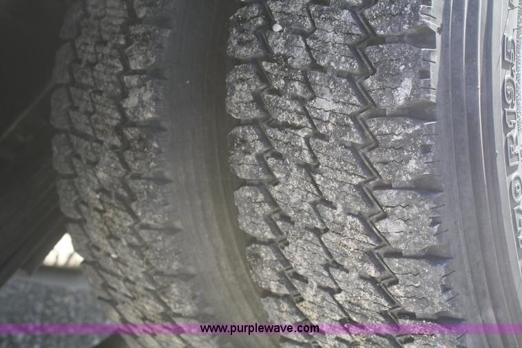 image for item F2692 2006 GMC C5500 Crew Cab flatbed truck