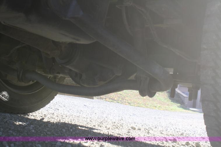 image for item F2692 2006 GMC C5500 Crew Cab flatbed truck