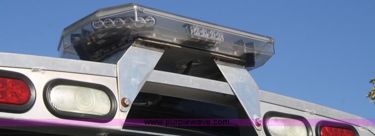 image for item F2692 2006 GMC C5500 Crew Cab flatbed truck