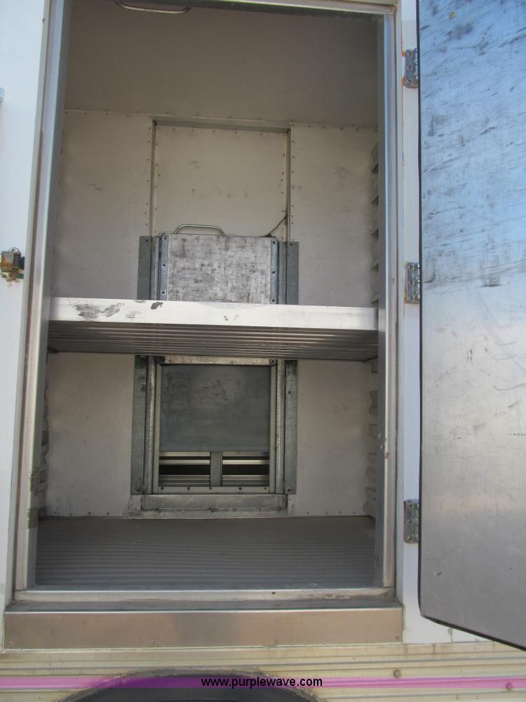 image for item F3055 1999 GMC C6500 refrigerated box truck