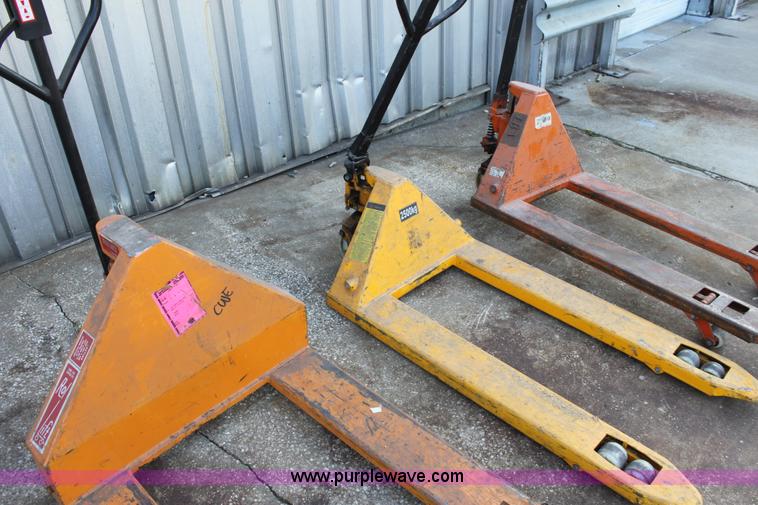 image for item V9328 (3) assorted pallet jacks