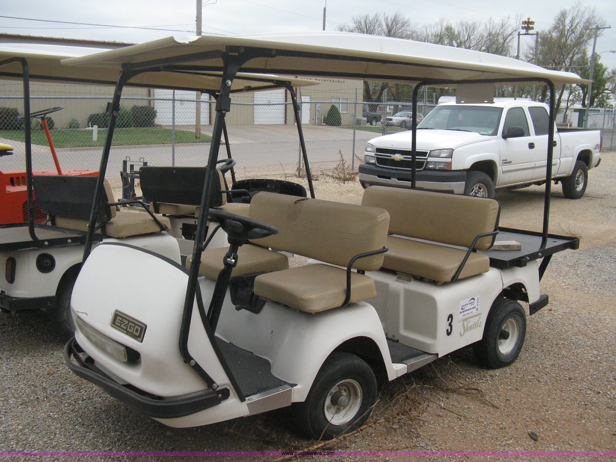 EZGO 954F shuttle golf cart in Cheney, KS Item B8281 sold Purple Wave