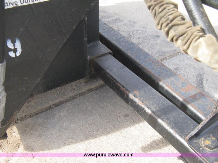 image for item B8261 Lowe XR21 trencher skid steer attachment