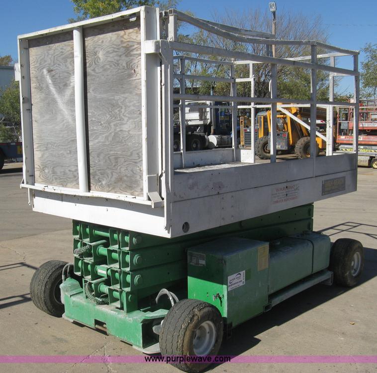 image for item B8293 1997 Mec 2558D scissor lift