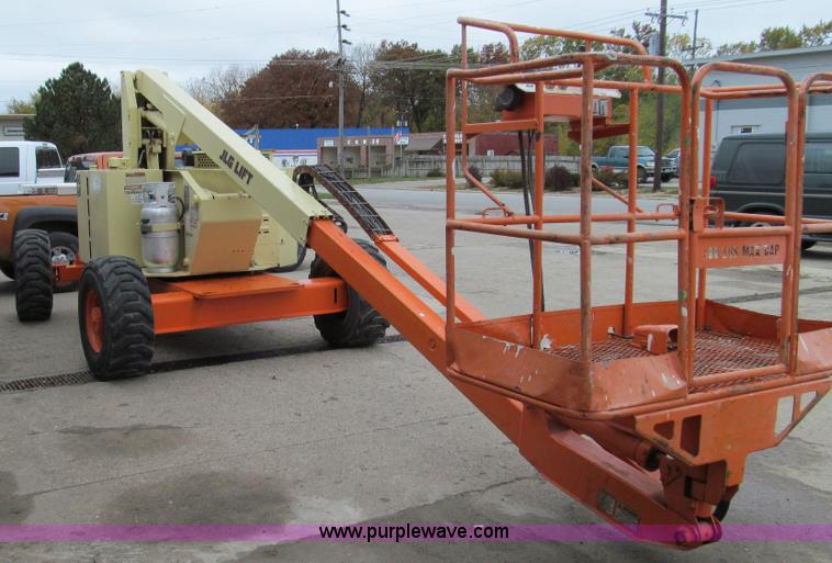image for item E3540 1995 JLG 40HA articulating boom lift