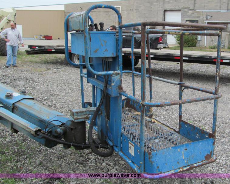 image for item E5599 1994 Genie S60 boom lift