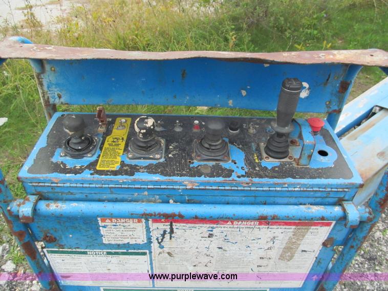 image for item E5599 1994 Genie S60 boom lift