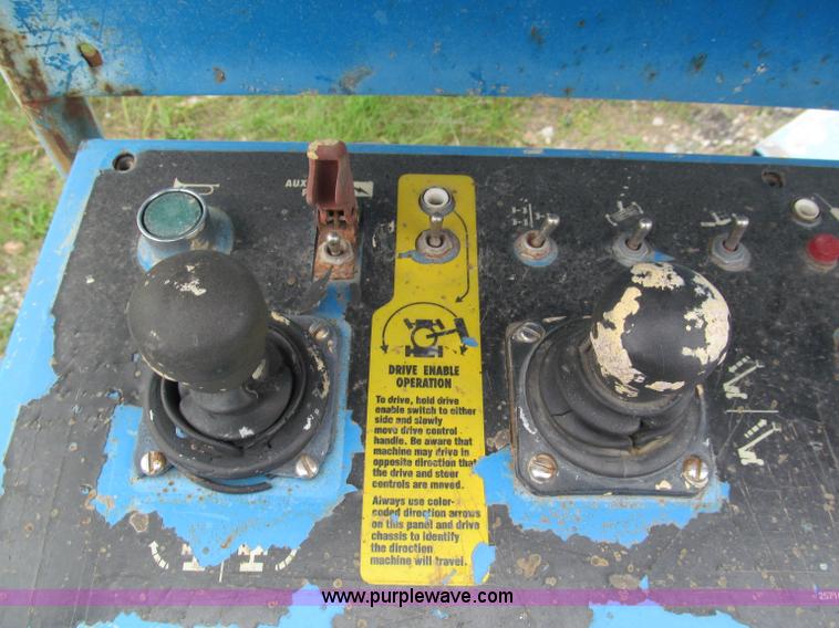 image for item E5599 1994 Genie S60 boom lift